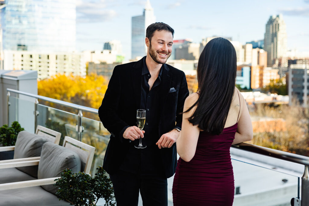 Guests enjoying champagne on the rooftop
